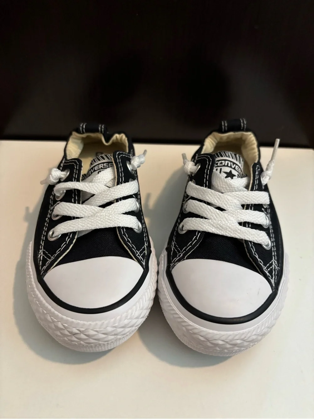 Kid’s Converse Black and White Unisex Low-Top Canvas Sneaker Pair